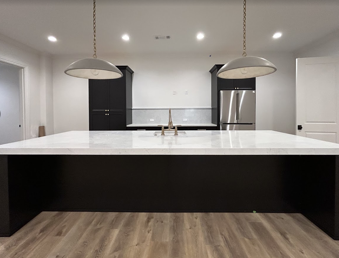 Interior kitchen painting with charcoal cabinetry and white walls in Seaford by Northern Star Painting